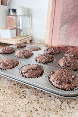 Chocolate protein muffin in muffin tin
